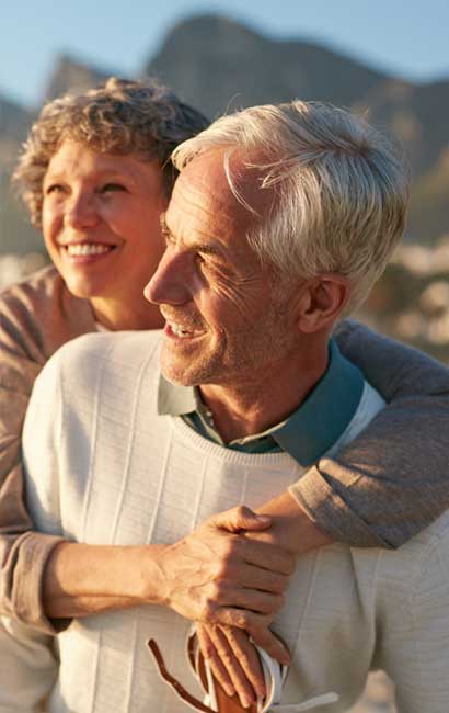 how fixed annuities work happy retired couple